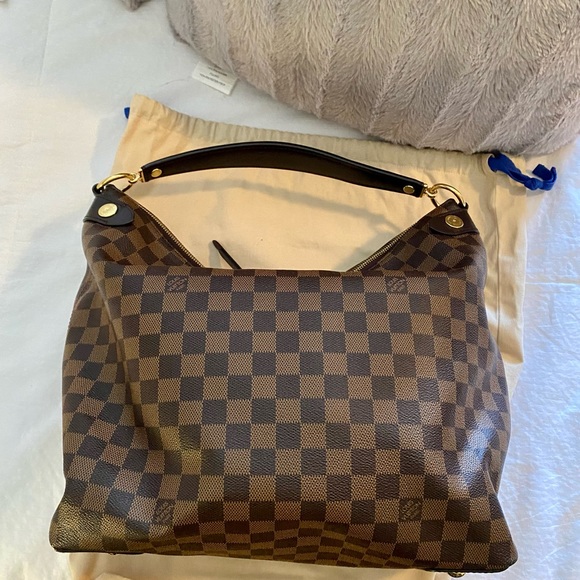 Authentic Louis Vuitton Duomo $1250 - Picture 2 of 5